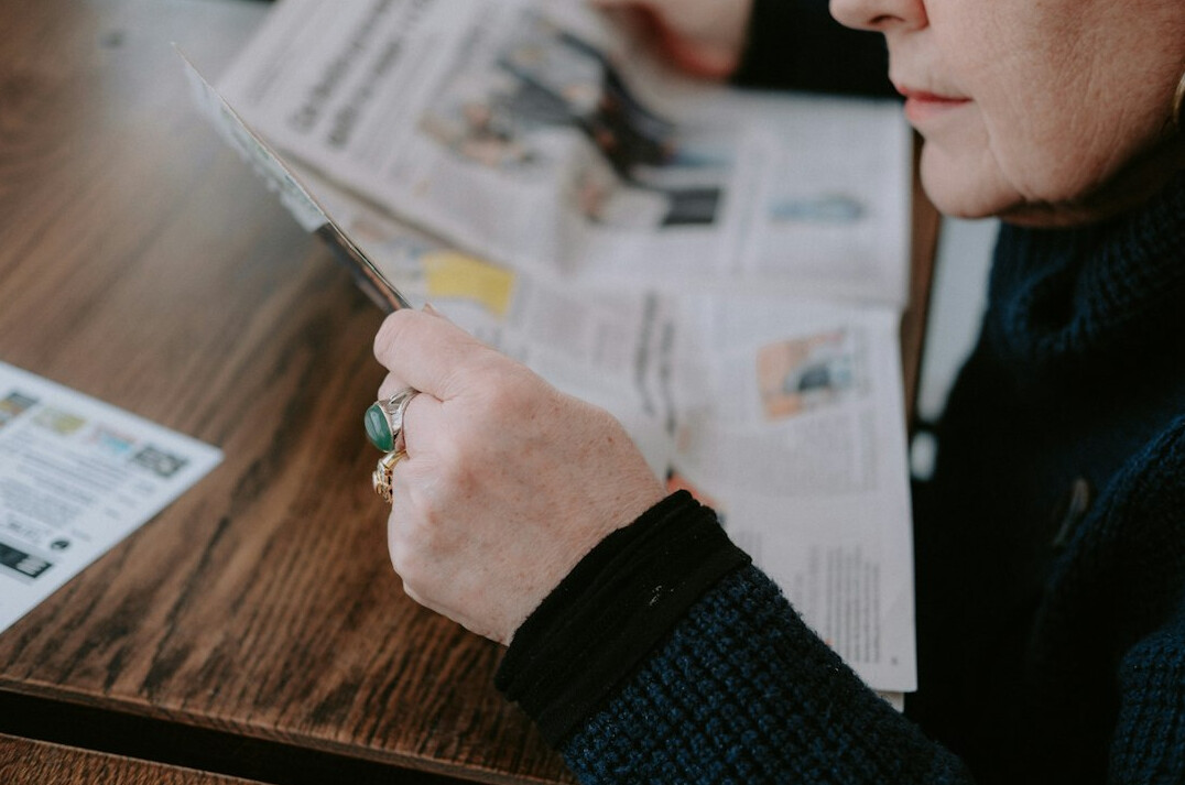 person reading news carefully