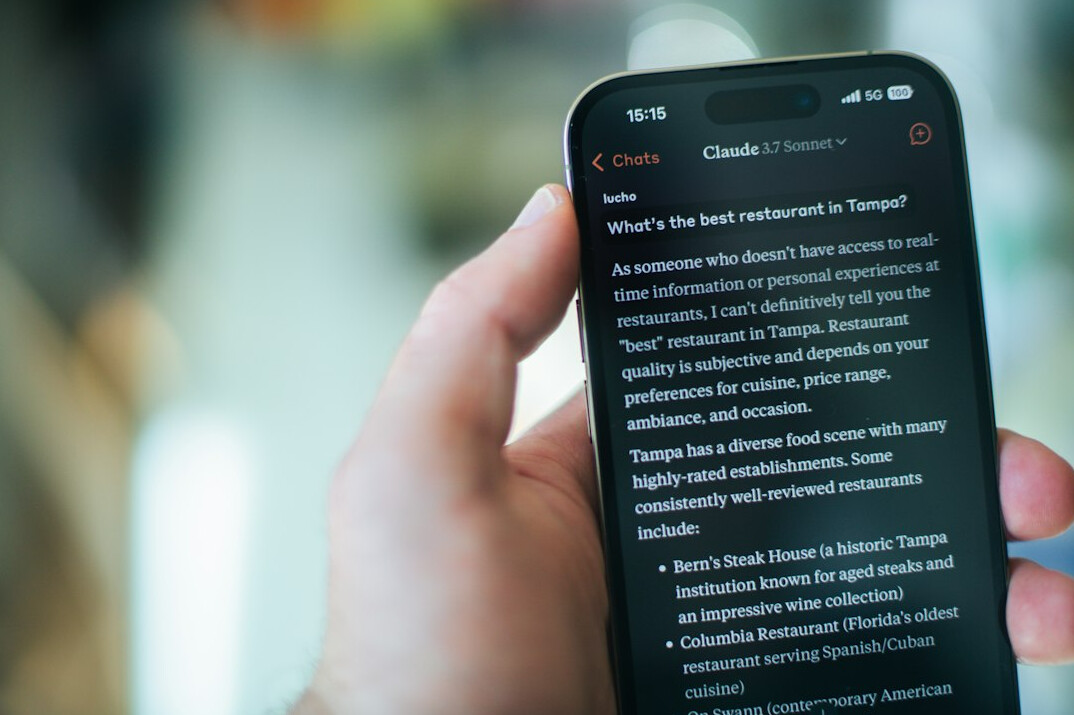 person reading fake news on phone