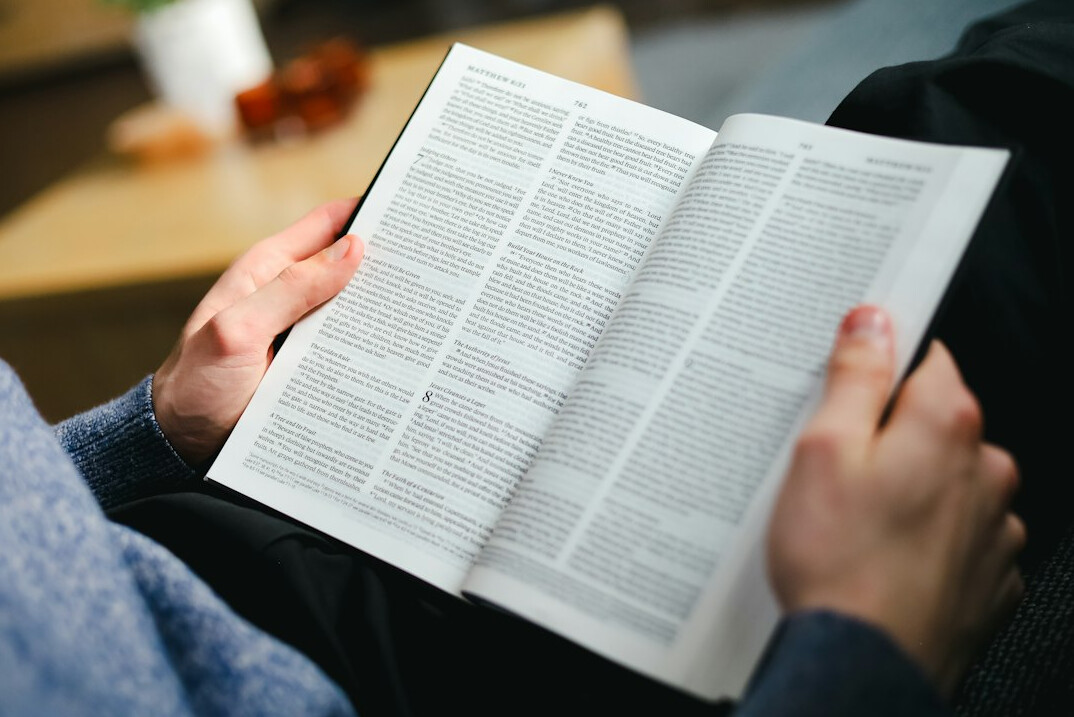 person reading newspaper