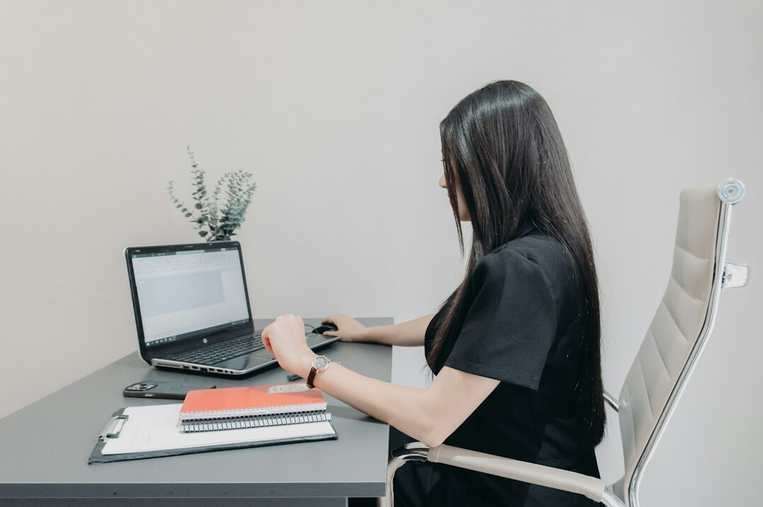 person working hard at desk